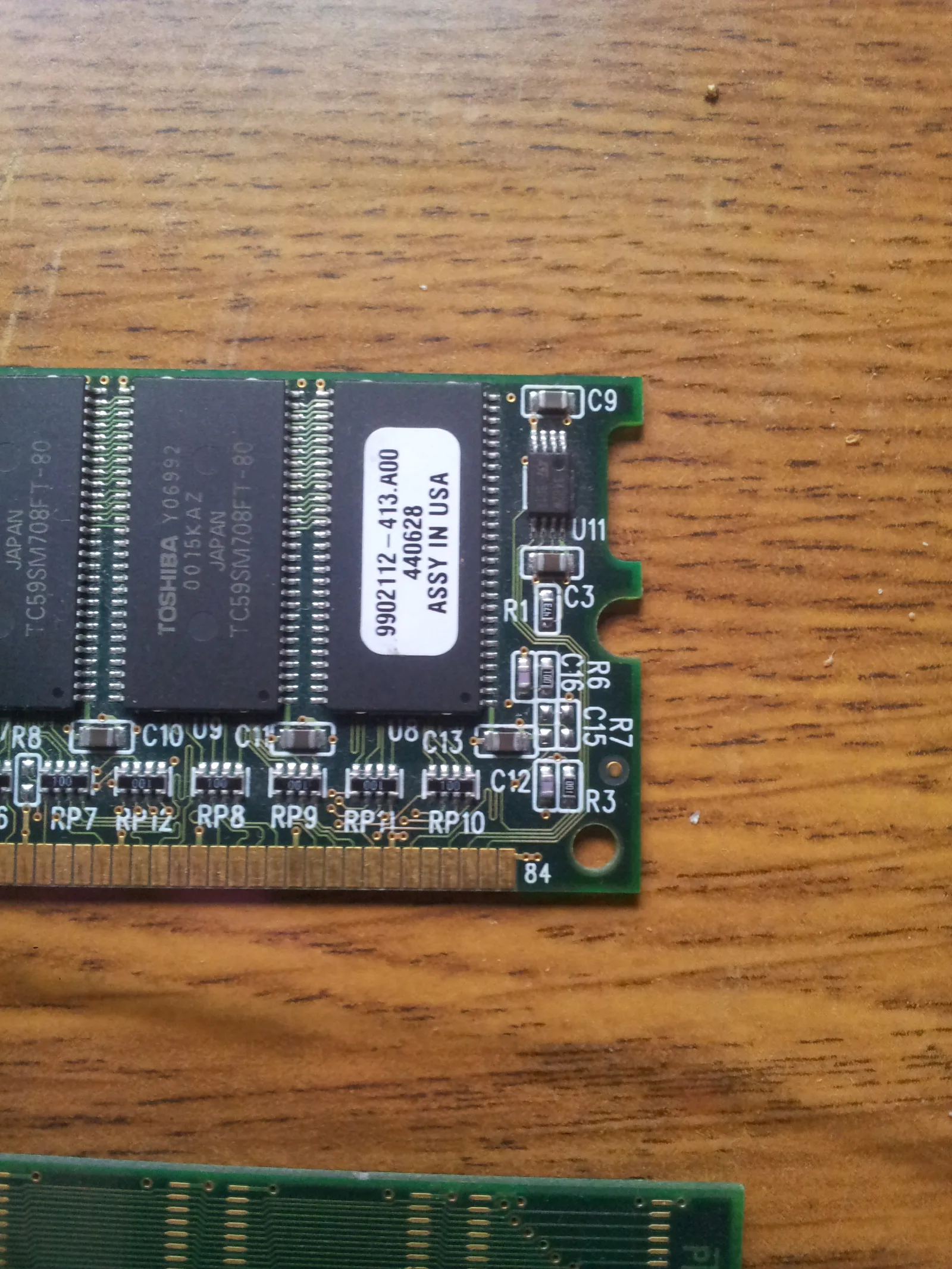 A close view of a memory module and its surface-mounted components